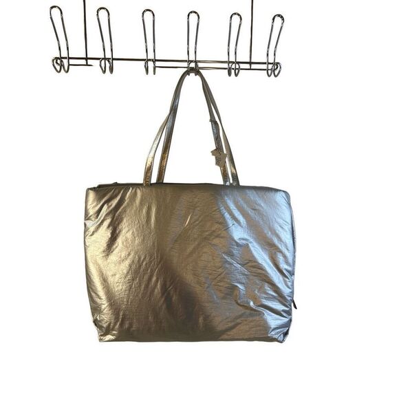 a new day Handbags - New Day Silver Puffer Zipper bag tote new18x13"